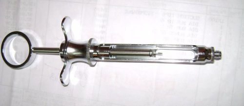 ASPIRATING SYRINGE FOR INJECTION AND ANESTHESIA