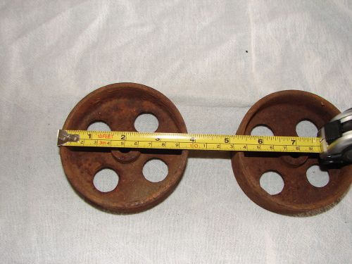 2 vintage cast iron industrial cart wheels  4 inch off set