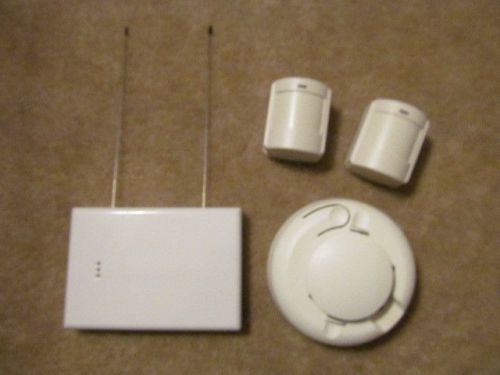 ONE LOT OF ELK M1 SECURITY WIRELESS RECEIVER AND SENSORS
