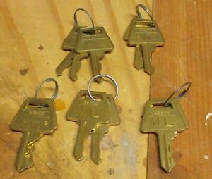 FIVE SETS OF PADLOCK KEYS AMERICAN LOCK