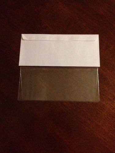 20,000 VINYL DOCUMENT HOLDER WITH FLAP..CLEAR.. 9 X 4 FOLDED. 9 X 7.75 OPEN.