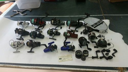 FISHING REEL LOT 16 REELS WITH MANY EXTRAS SOME NEW SOME USED SOME OLD