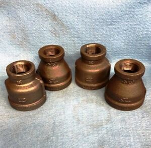 MALLEABLE BLACK IRON REDUCING COUPLING 1-1/4&#034; X 3/4&#034;  ** LOT OF 4 **
