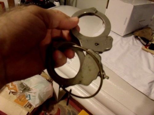 Vintage Peerless handcuff co. Made in Springfield Mass. Handcuff, key &amp; holster