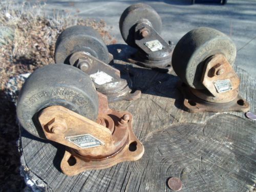 Vintage set  4 heavy duty swivel industrial casters salvaged steampunk hard rbr. for sale