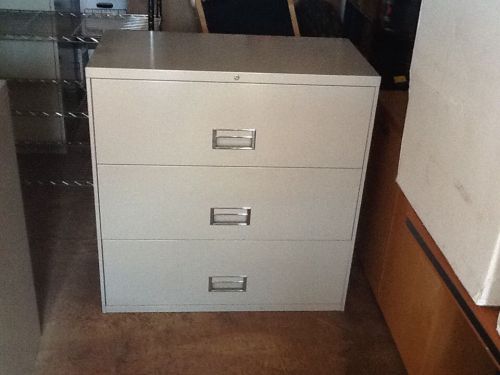 Three draw lateral file cabinet
