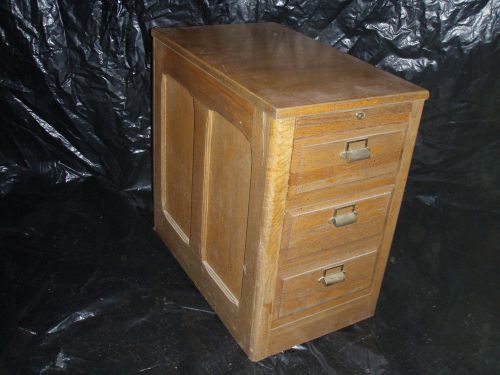Oak, wooden file cabinet, two drawers, on wheels