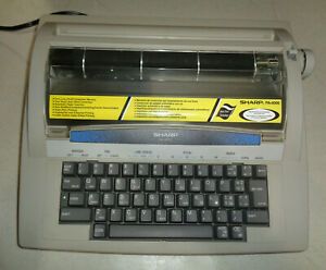 ~Sharp model PA-4000 Portable Electric Typewriter w/ Cover ~Read details Works~
