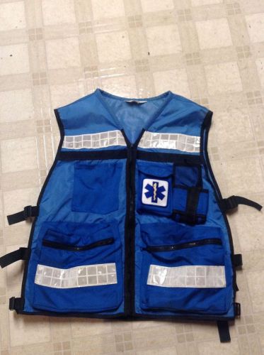 Blue EMT EMS safety vest size large radio pocket.