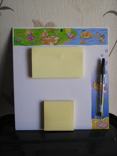 Memo board with 200 sticky notes and a biro.