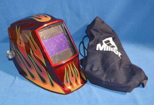 Miller 216323 welding helmet auto darkening red flame w/ bag for sale