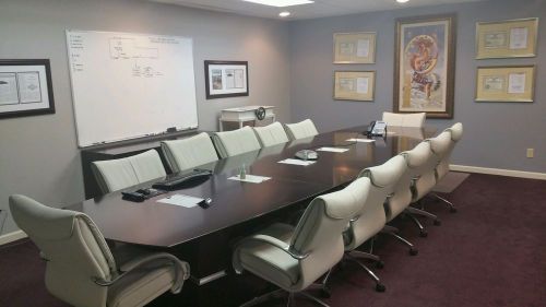 Special made conference table with real leather chairs