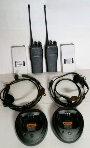 2 motorola radius cp 200 uhf 4 ch. radios, chargers, headsets, new batteries for sale