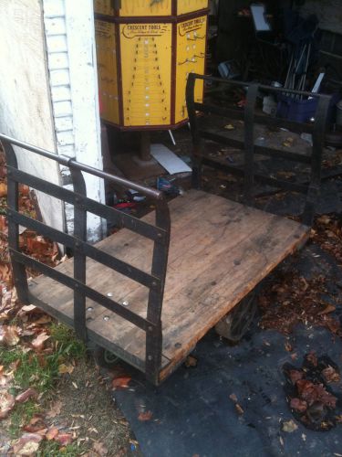 Vintage rare unique industrial coffee table cast iron / wrought iron cradle cart for sale