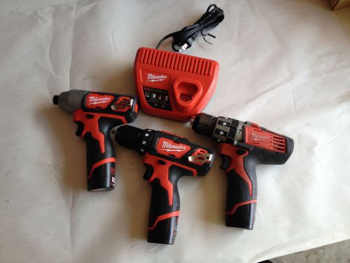 Milwaukee m12 3 tool kit w/ 2462-20, 2407-20, 2411-20, 3 batteries and charger for sale