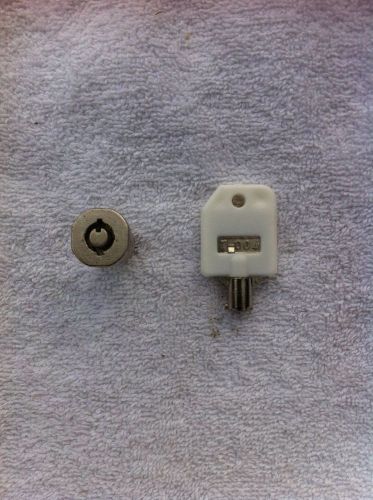 1 lock &amp; White T-004 Key for 1-800 Vending, LYPC, SSF, V-Line, NAV and others