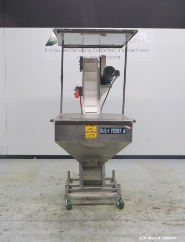 Used- Incline Belt Conveyor With Stainless Steel Feed Hopper. Unit has hopper di