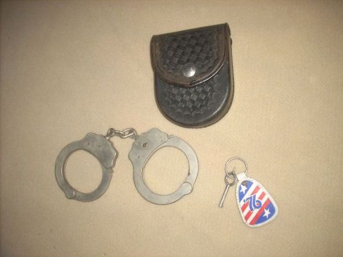 OLD SAFARILAND HANDCUFFS with KEYS and LEATHER POUCH, VERY NICE, !