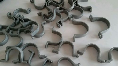 Pvc 2 hole straps 1 inch and 1-1/4  mixed sizes  lot of 30 for sale