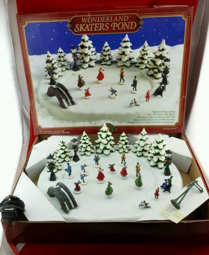 Christmas Fantasy Wonderland Skaters Pond 1996 Animated with extra people/ signs