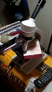 wolfe microscope comes with box of glass slides