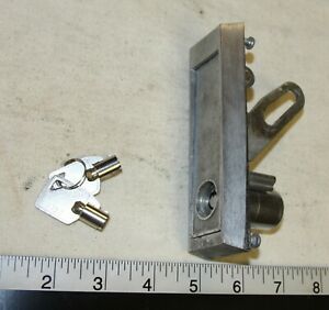 National L handle assembly for vending machines with a lock and 2 keys