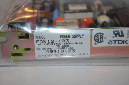 TDK FAK12-1R3 Constant Voltage Power Supply Input: 100-120VAC Output: 12VDC 1.3A