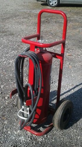 Wheeled fire extinguisher, 50 lb, 50 ft buckeye filled charged for sale
