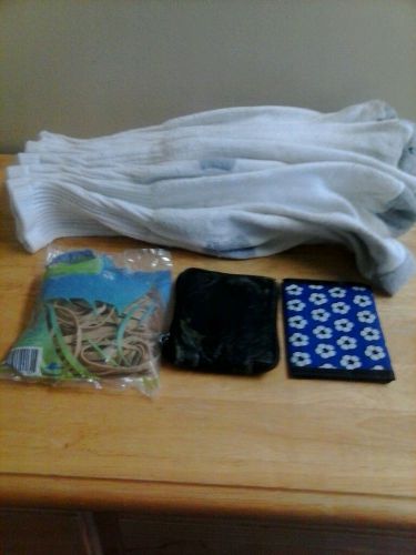 Lot 16 items 13 white socks 2 wallets 1 pack of rubber bands all used
