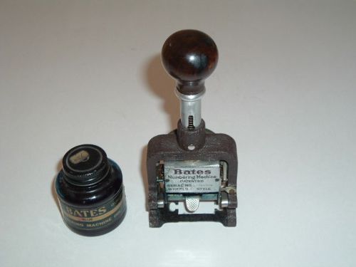 Vintage Bates numbering machine and bottle