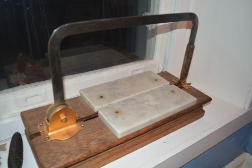 ANTIQUE CHEESE CUTTER