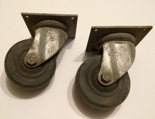 Pair of vintage industrial bassick  5&#034; x 2&#034; phenolic  swivel casters for sale