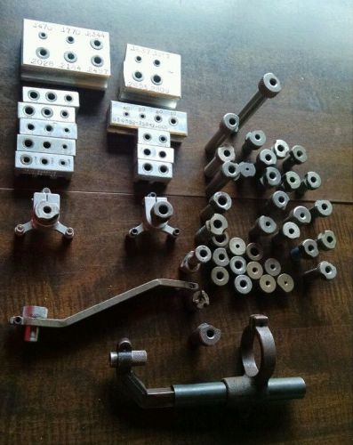 Slip drill bushing &amp; spring guide w/ tripods and accessories. Lot of 55.