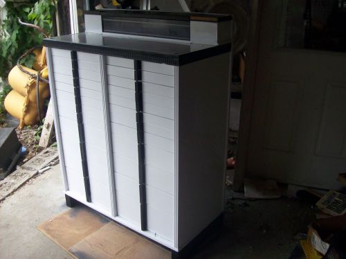 american metal dental cabinet with milk         glass trays