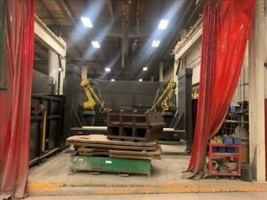 LINCOLN WELD CELL W/ (2) FANUC M710IC/20L ROBOTS  15K LB POS B42387