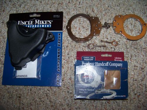 NIP Uncle Mike&#039;s Kydex Handcuff Case &amp; NIP Peerless Handcuffs Set