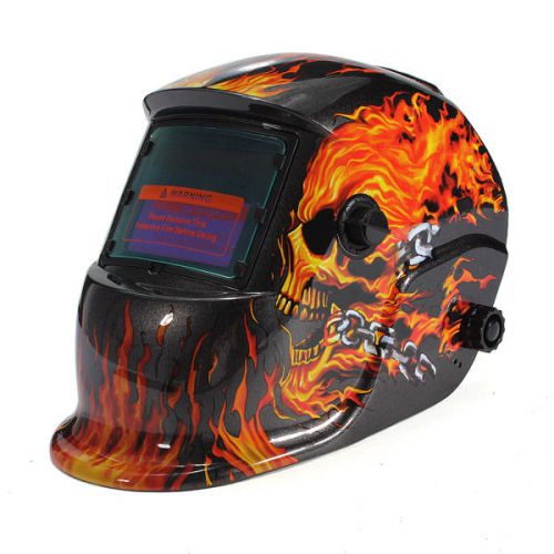 Electrical welding helmet solar energy automatic darkening skull mask for sale
