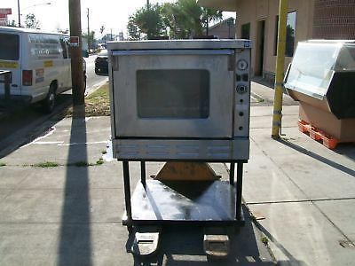 CONVECTION OVEN,,GAS, WOLF, 115VMOTOR, 3 SHELVES, W/STAND, 900 ITEMS ON EBAY