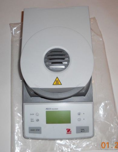 New Ohaus MB 35 Moisture Analyzer with 2 Boxes of Trays Part #13865