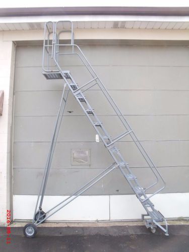 Cotterman narrow aisle rolling steel ladder 300 lb cap 12-steps 16 inch wide for sale