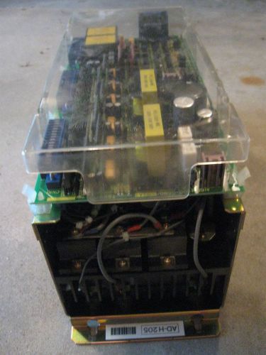 Fanuc servo amplifier unit, # a06b-6057-h205, top board# a16b-1200-0680 03a used for sale