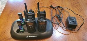 Motorola (HMN9026A) 4 Microphones &amp; 1 (CPD-6) Charger + 4 Radios And 6 Batteries