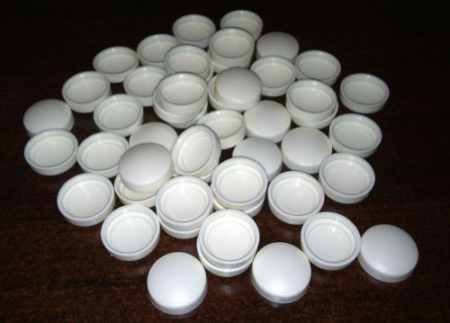 Screw cover lot of 49  cream color - retail value $14.21 for sale