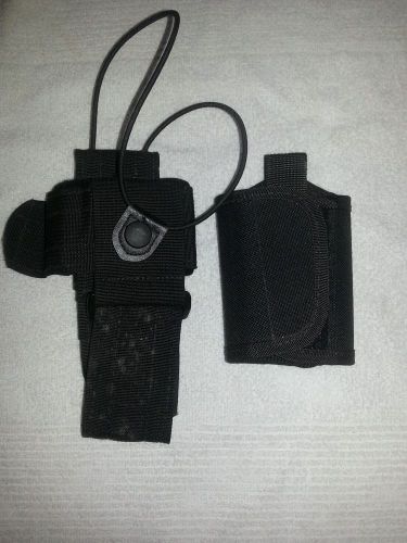 Adjustable radio holster and black hawk key holder