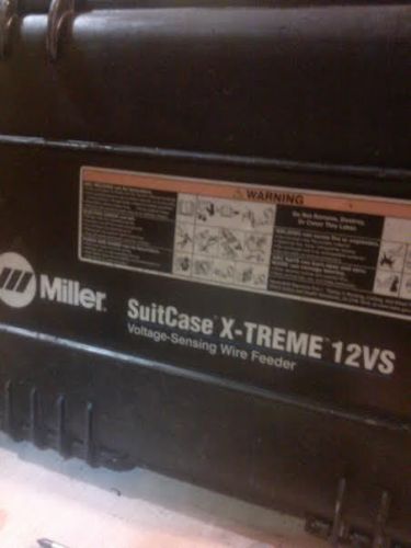 Miller suitcase x-treme 12vs wire welder w/ new weld flexible gun 12-vs 300876 for sale
