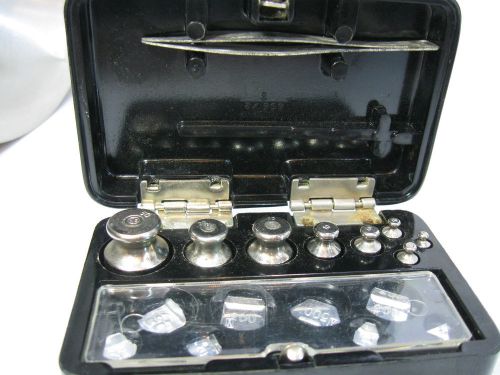 A RARE SET OF VINTAGE RUSSIAN WEIGHING SCALES WEIGHTS IN THEIR BAKELITE BOX