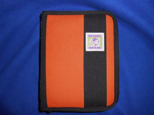 Student planner, american studio, zips, spiral book, holds cds, $ pocket 4 x 6.5 for sale