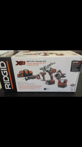 Ridgid 18v 5 pc. combo kit plus an additional 18 v lithium ion battery for free for sale