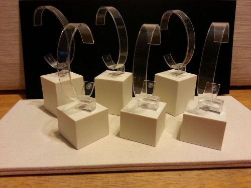 Fossil watch / bracelet display stands, cream in color for sale