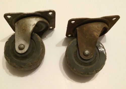 Pair of vintage industrial 4&#034; cast  bassick 461 swivel casters for sale